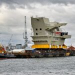 On Britain’s largest warship, QR codes map the way